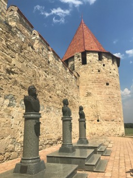 Busts outside the entrance to Bender Fortress